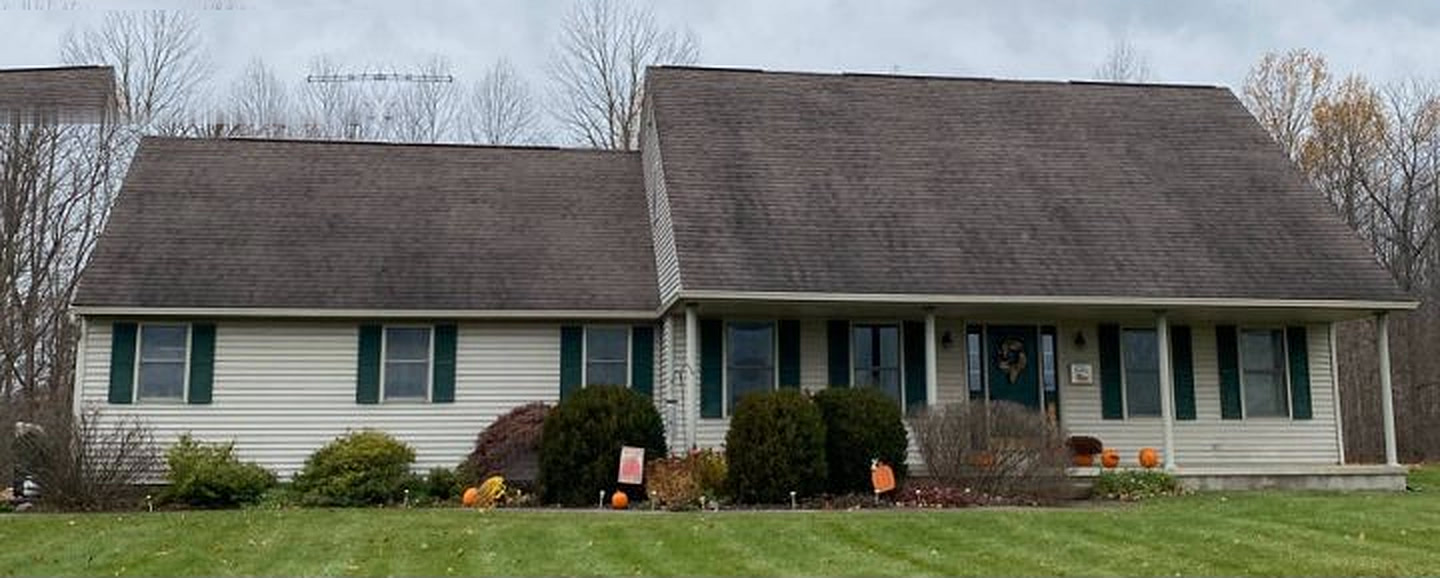 Worn asphalt shingle roof before HomeX reroof