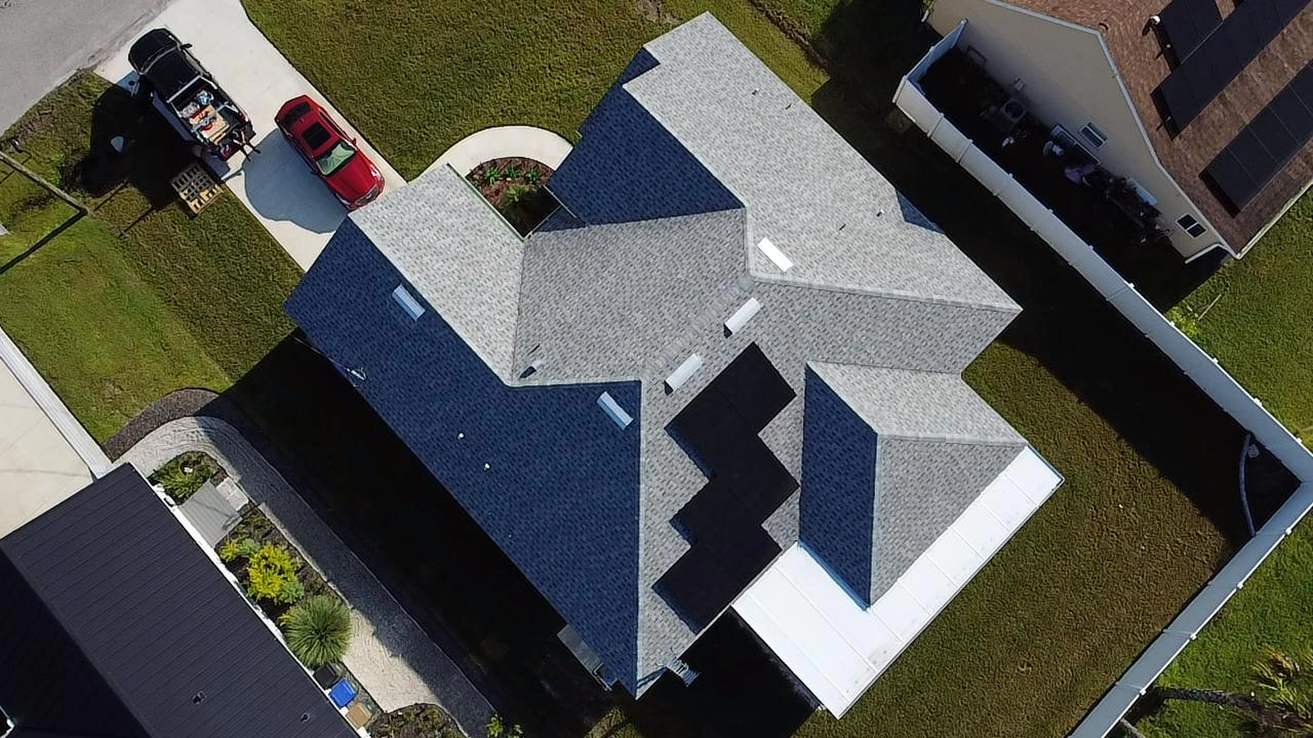 Aerial drone view of a completed HomeX solar install and roof